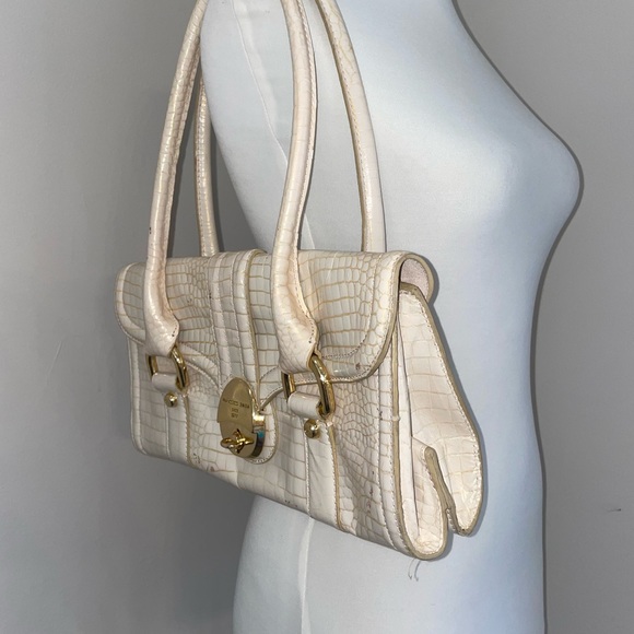 Francesco Biasia handbag suede interior lining